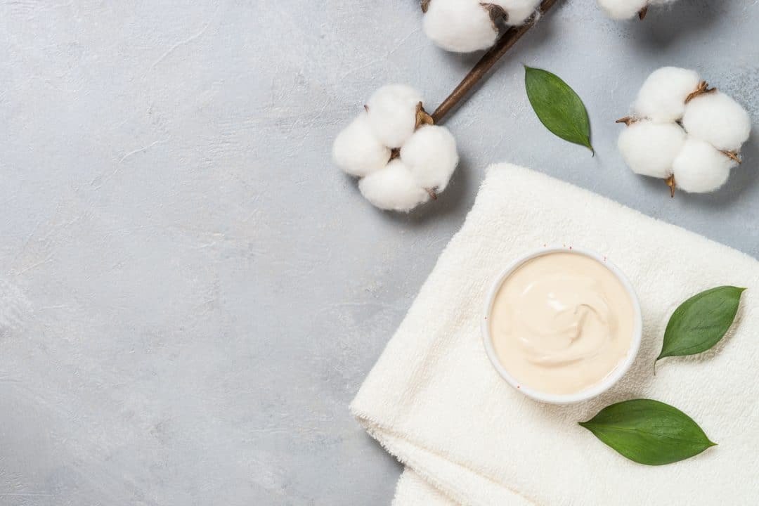 clay mask and towel skincare product 1